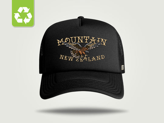 A black trucker-style cap with &